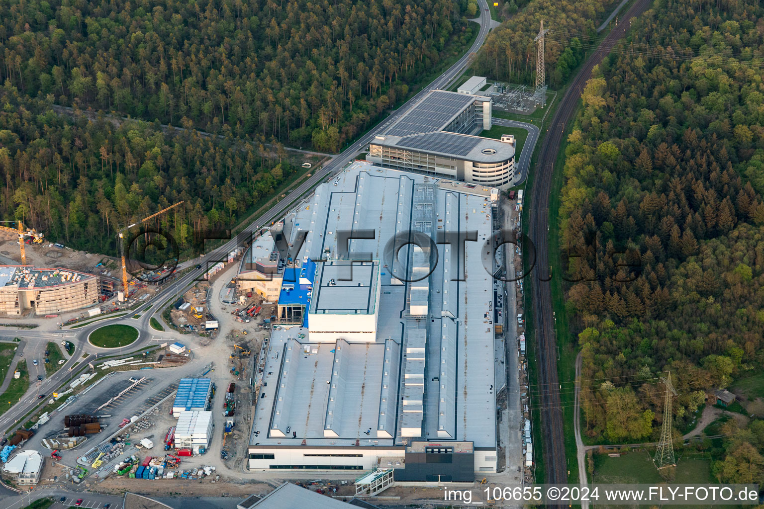 Drone image of Extension - new building - construction site on the factory premises of SEW-EURODRIVE GmbH & Co KG in Graben-Neudorf in the state Baden-Wurttemberg, Germany