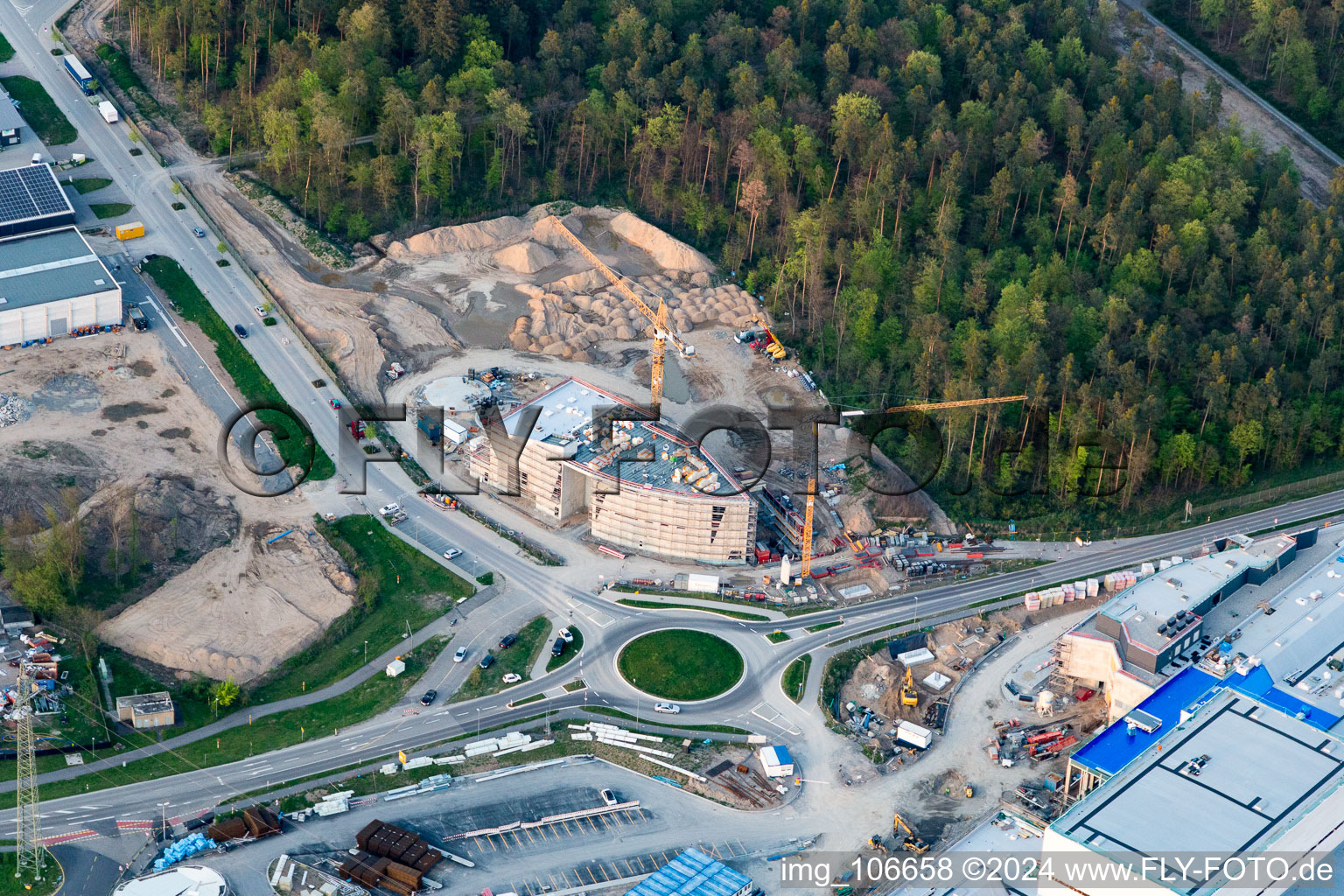 Extension - new building - construction site on the factory premises of SEW-EURODRIVE GmbH & Co KG in Graben-Neudorf in the state Baden-Wurttemberg, Germany from the drone perspective