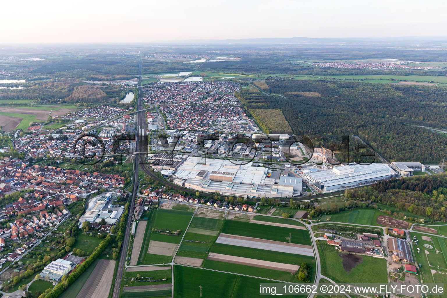 Extension - new building - construction site on the factory premises of SEW-EURODRIVE GmbH & Co KG in Graben-Neudorf in the state Baden-Wurttemberg, Germany from a drone