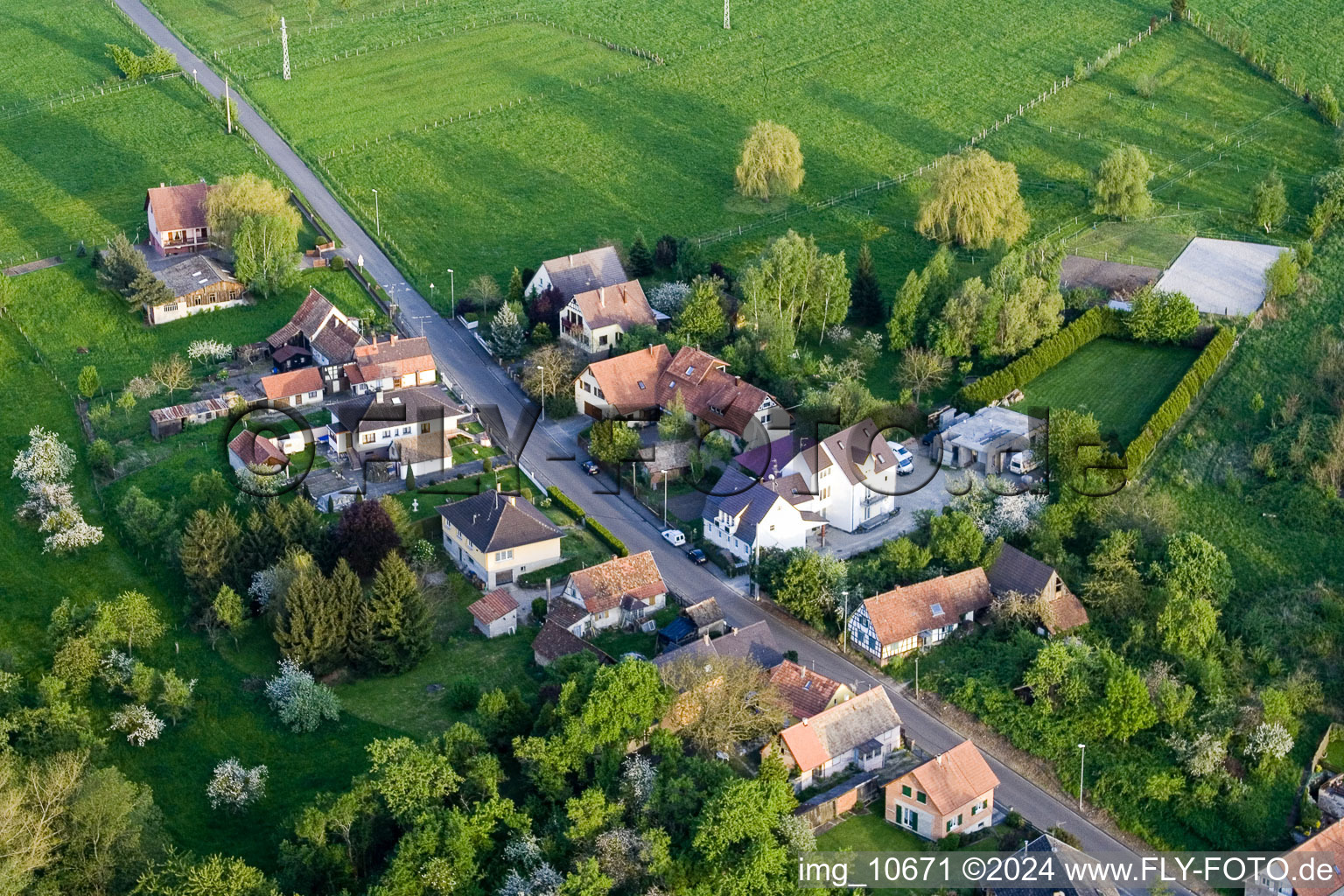 Village - view on the edge of agricultural fields and farmland in Durrenbach in Grand Est, France