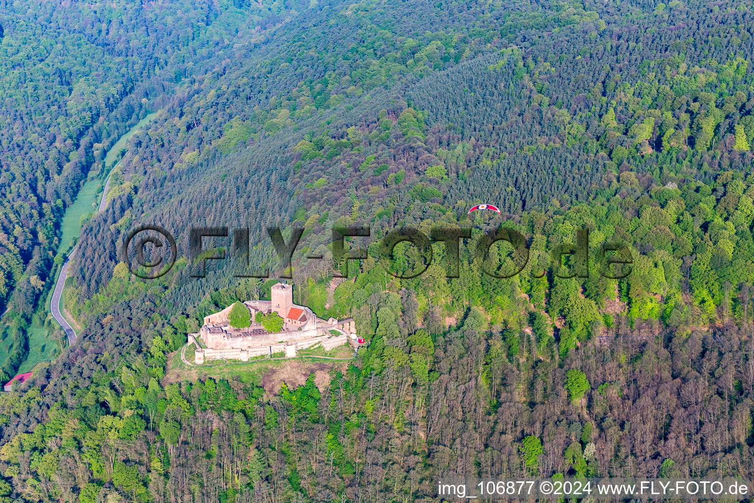 Landeck ruins with paraglider in Klingenmünster in the state Rhineland-Palatinate, Germany