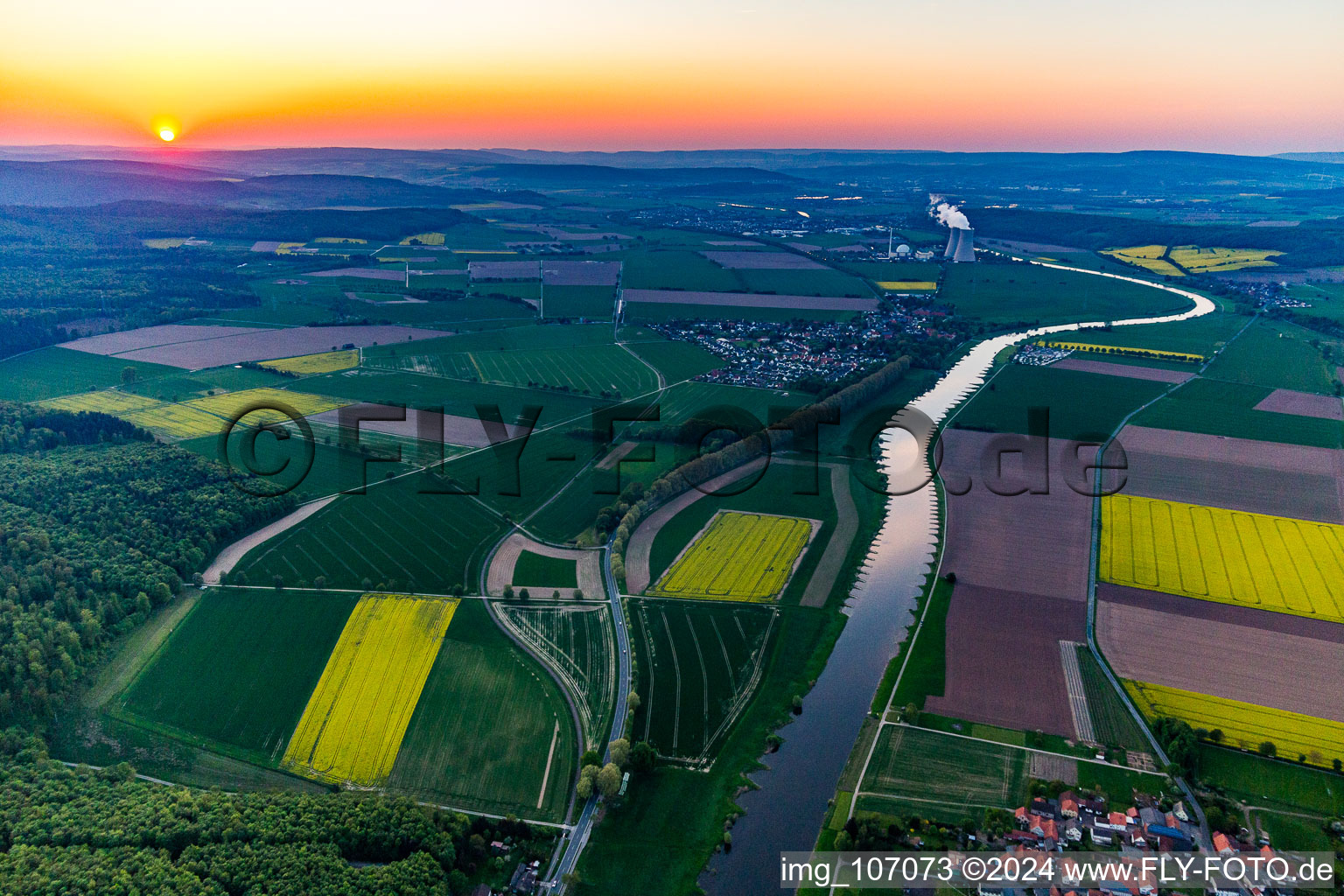 Nuclear power plant Grohnde from a distance at sunset in the district Grohnde in Emmerthal in the state Lower Saxony, Germany