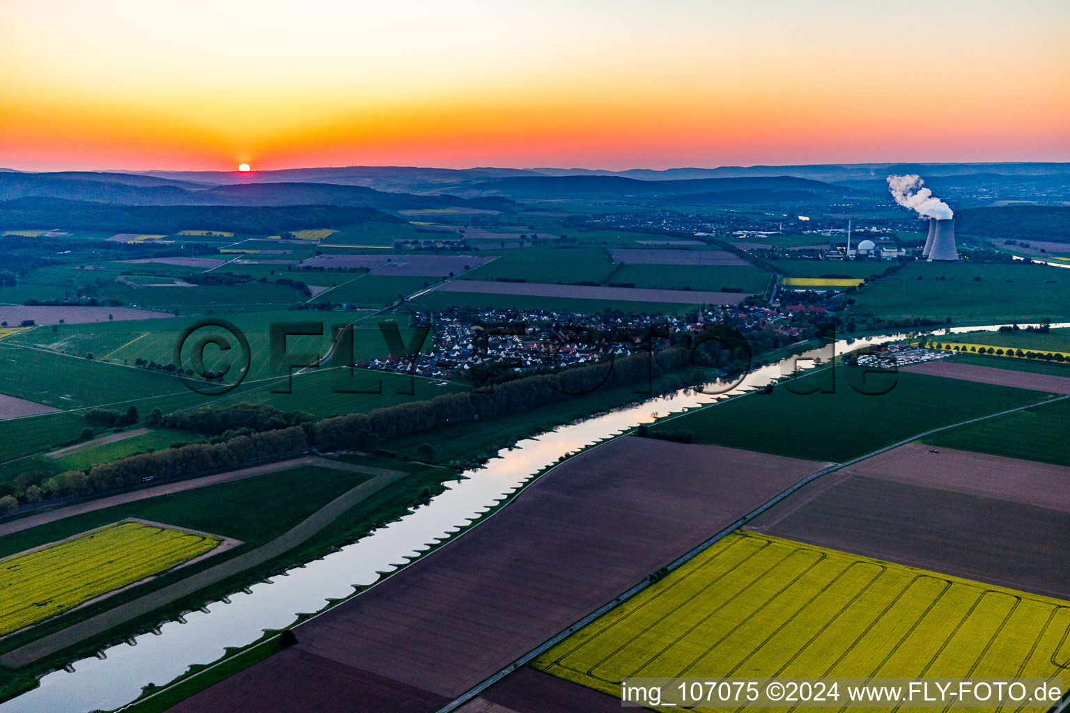 Aerial photograpy of Nuclear power plant Grohnde from a distance at sunset in the district Grohnde in Emmerthal in the state Lower Saxony, Germany