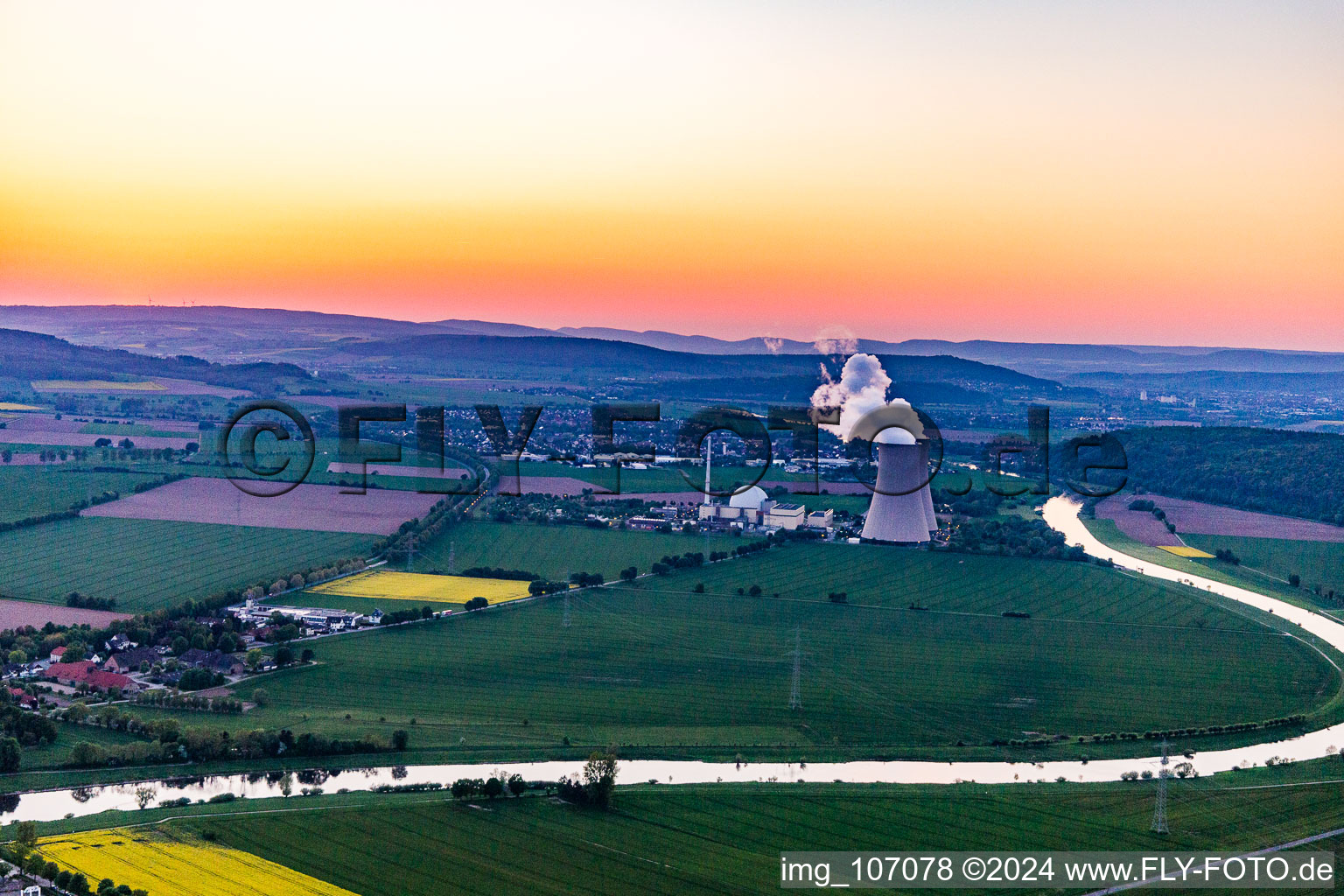 Aerial view of Nuclear power plant Grohnde at sunset in the district Grohnde in Emmerthal in the state Lower Saxony, Germany