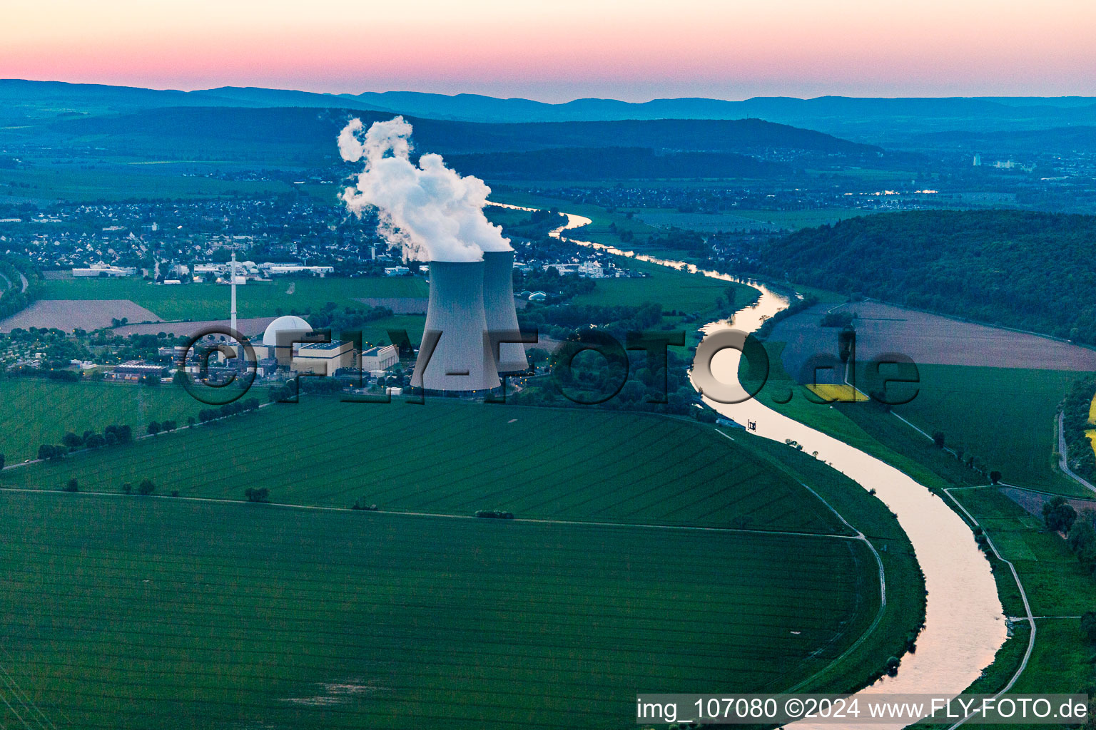 Oblique view of Nuclear power plant Grohnde at sunset in the district Grohnde in Emmerthal in the state Lower Saxony, Germany