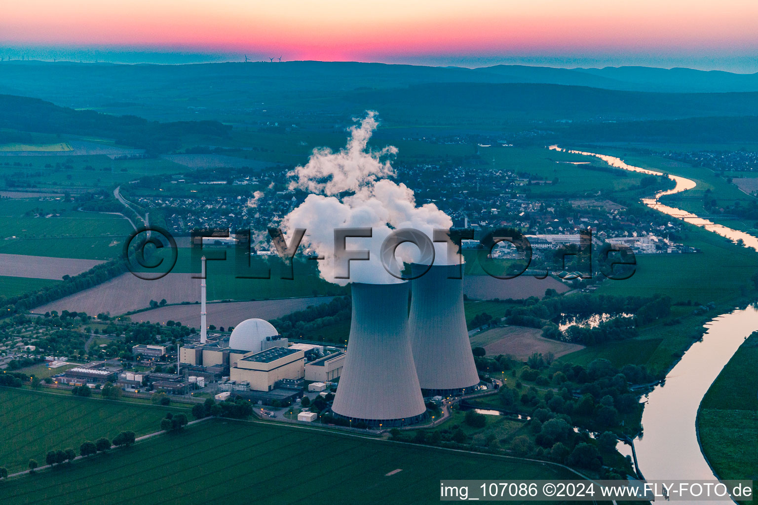 Nuclear power plant Grohnde at sunset in the district Grohnde in Emmerthal in the state Lower Saxony, Germany from the plane