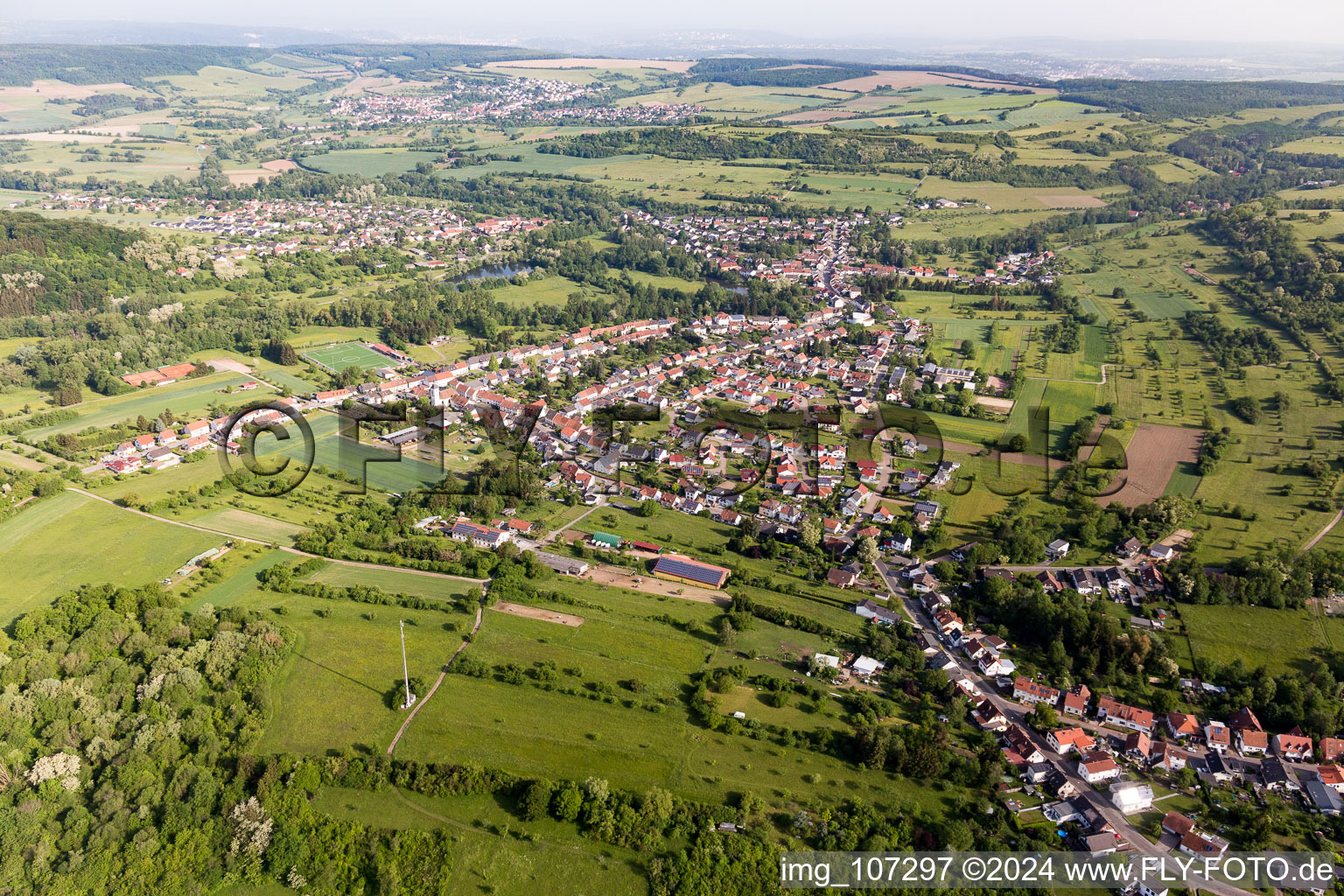 Agricultural land and field borders surround the settlement area of the village in Bliesmengen-Bolchen in the state Saarland, Germany