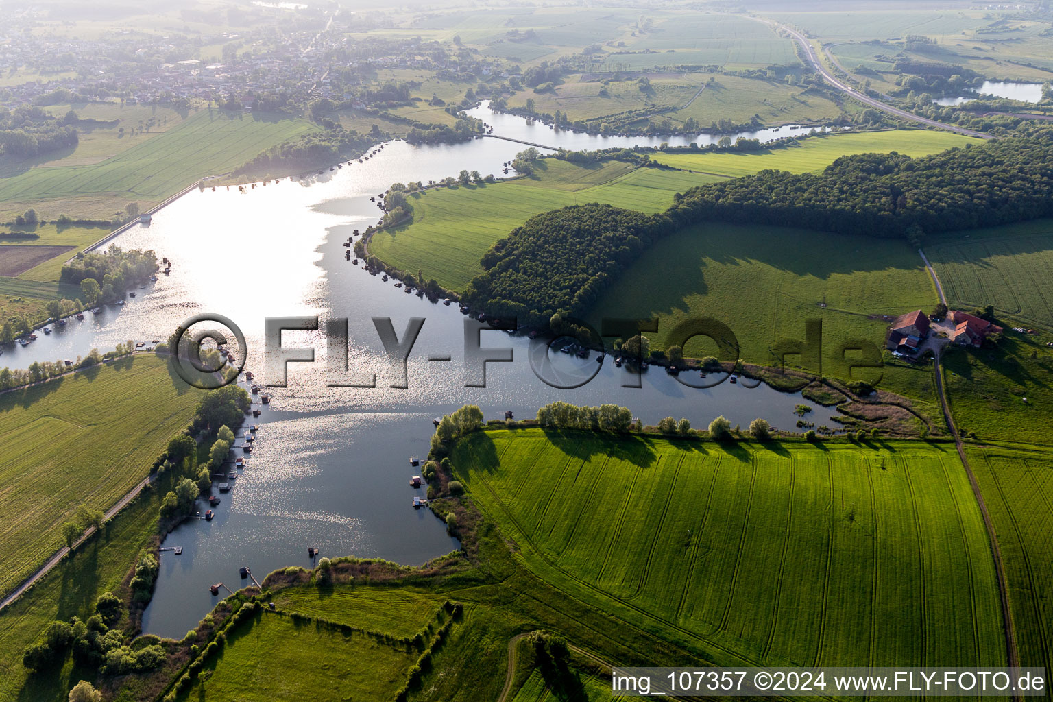 Waterfront landscape on the lake etange biscornu in Puttelange-aux-Lacs in Grand Est, France