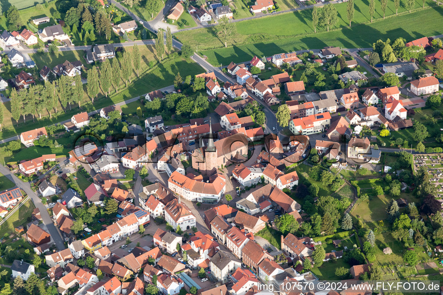 Aerial photograpy of Village view on the edge of agricultural fields and land in Mudau in the state Baden-Wurttemberg, Germany