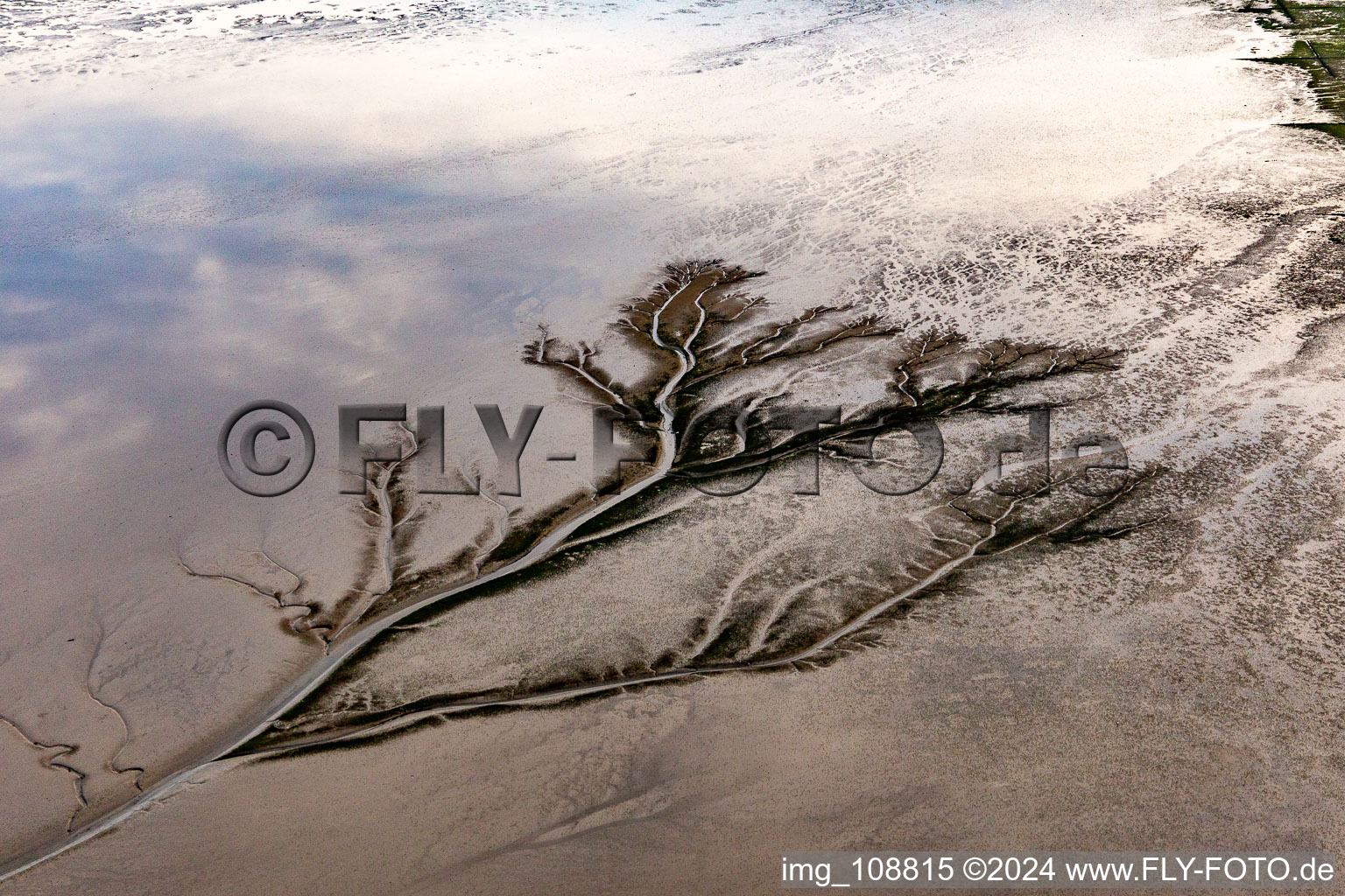 Mudflat graphic at the mouth of the Eider into the North Sea in Tönning in the state Schleswig Holstein, Germany