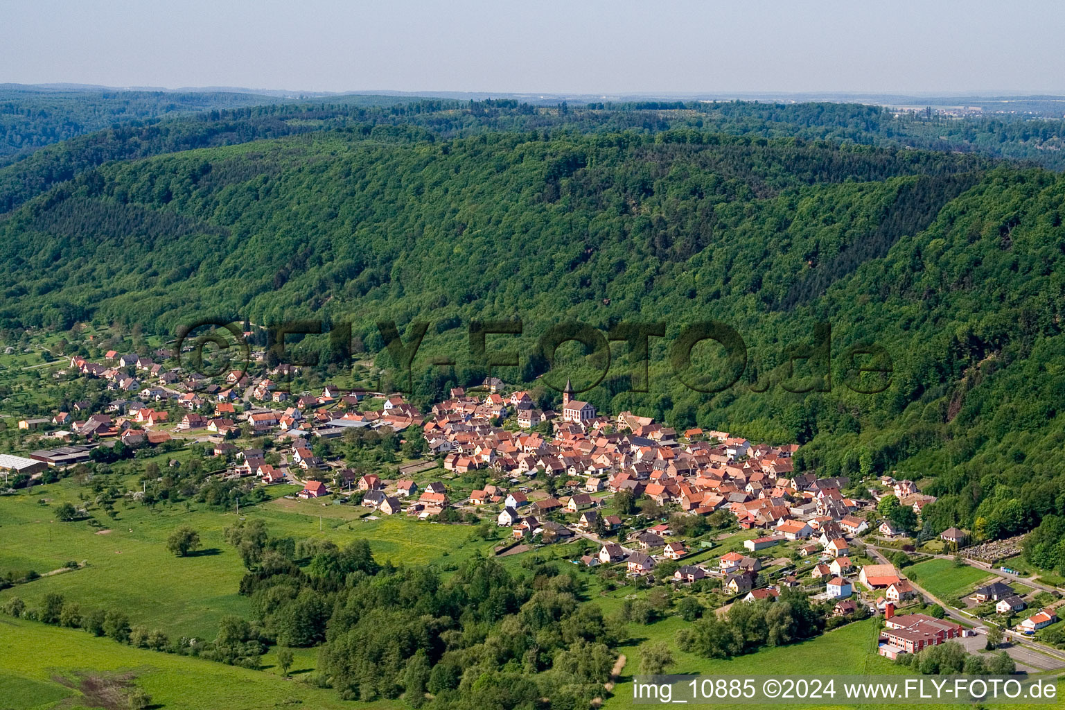 Village - view on the edge of agricultural fields and farmland in Ernolsheim-lA?s-Saverne in Grand Est, France