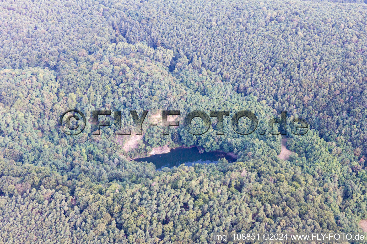 Aerial photograpy of Basalt lake, old quarry in Wachenheim an der Weinstraße in the state Rhineland-Palatinate, Germany