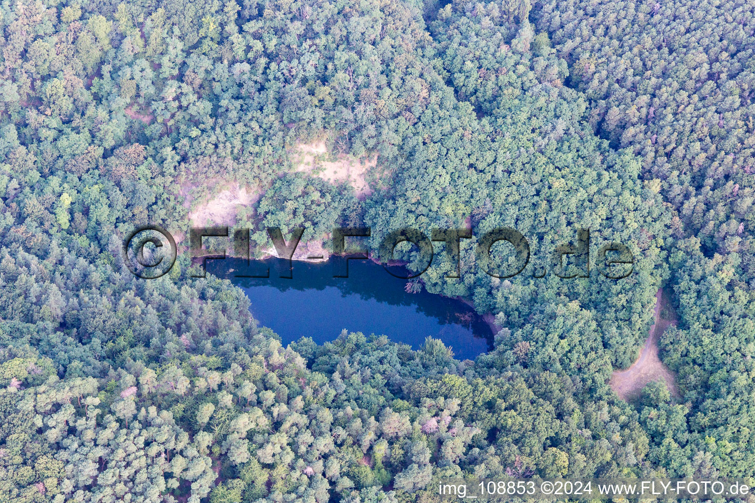 Aerial photograpy of Basalt lake Aalter quarry in Wachenheim an der Weinstraße in the state Rhineland-Palatinate, Germany