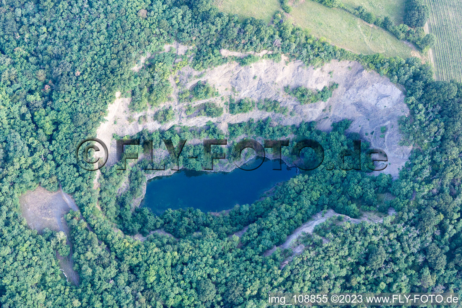 Oblique view of Basalt lake Aalter quarry in Wachenheim an der Weinstraße in the state Rhineland-Palatinate, Germany