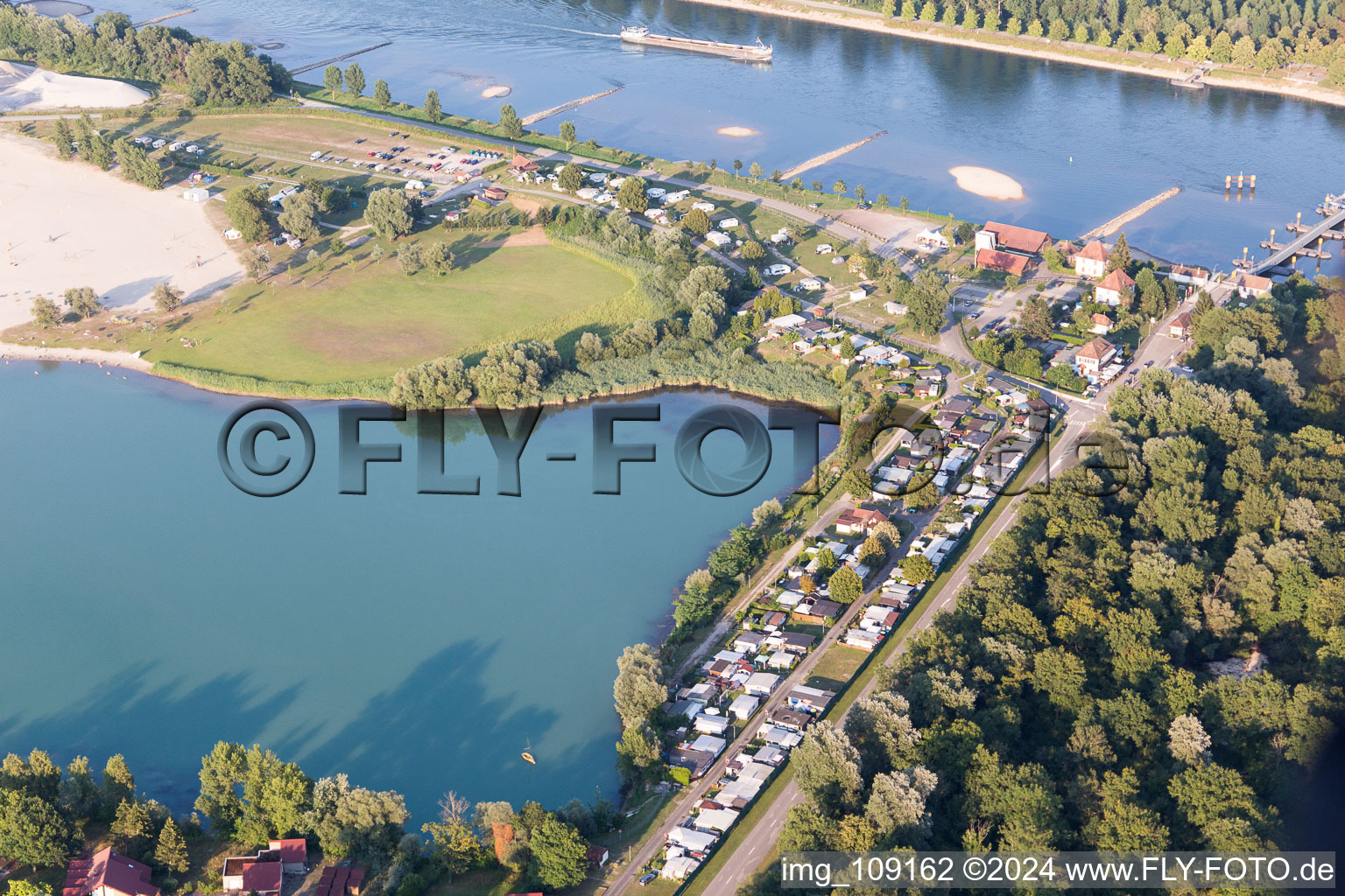 Lake and ferry in Seltz in the state Bas-Rhin, France