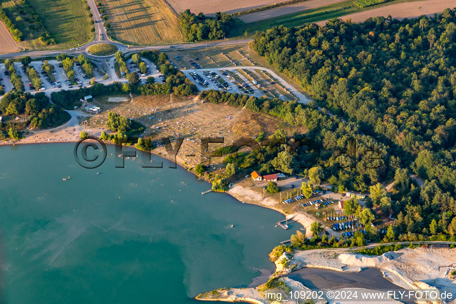 Aerial view of Bathers in and on the beach of Epplesee in the district Silberstreifen in Rheinstetten in the state Baden-Wuerttemberg, Germany