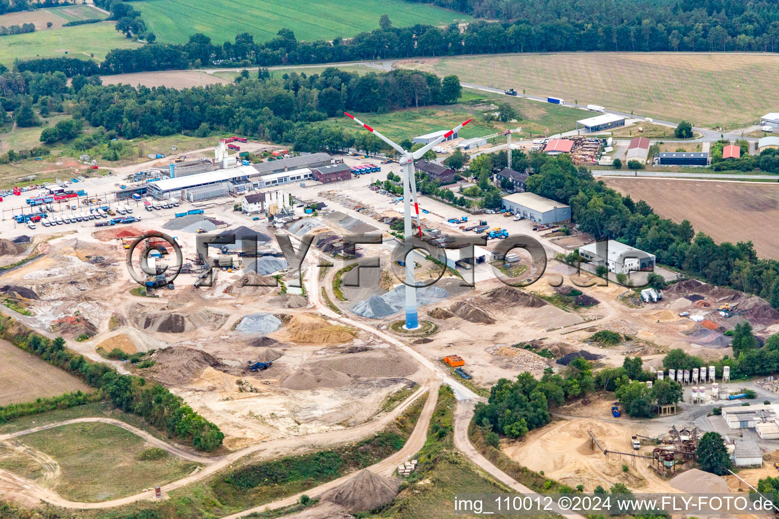 Wind turbine in the industrial park with Arkema GmbH in Barendorf in the state Lower Saxony, Germany