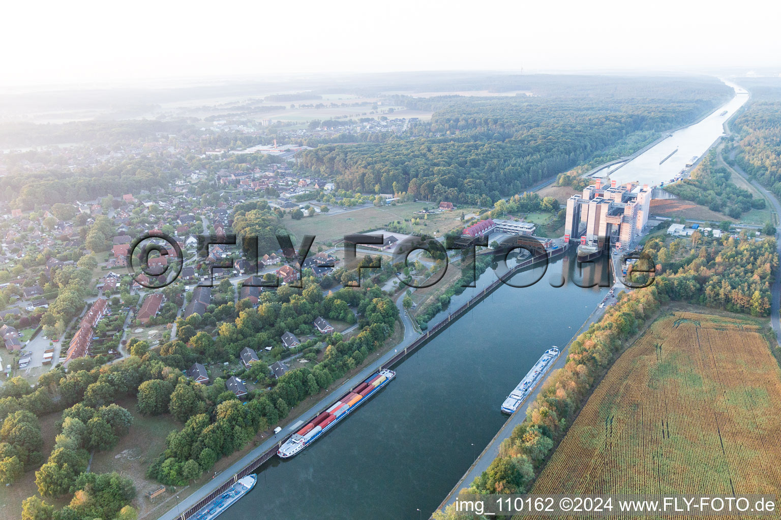 Boat lift and locks plants on the banks of the waterway of the Elbe side channel in Scharnebeck in the state Lower Saxony, Germany seen from above