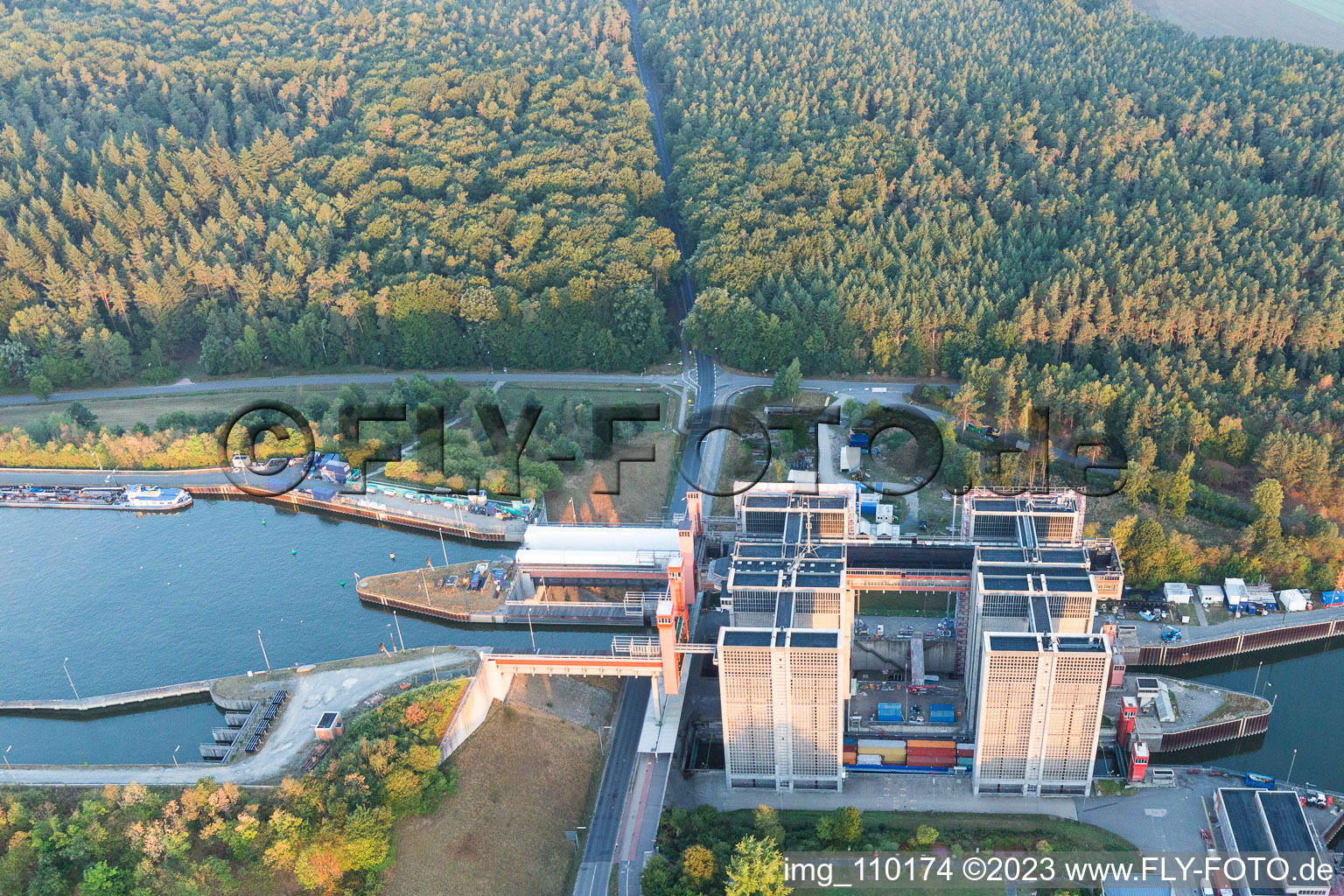 Boat lift and locks plants on the banks of the waterway of the Elbe side channel in Scharnebeck in the state Lower Saxony, Germany seen from a drone
