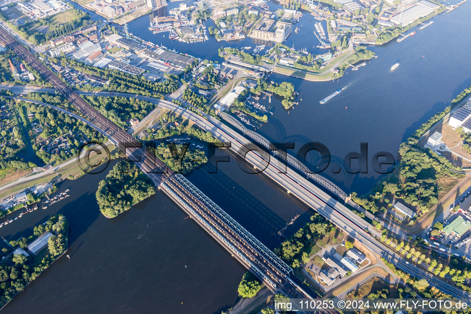 River - bridges: Old Elbe-bridge of Harburg, Bridge of the 17. June, Motorwaybridge of A253 and Railwaybridge crossing the southern Elbe in Hamburg, Germany