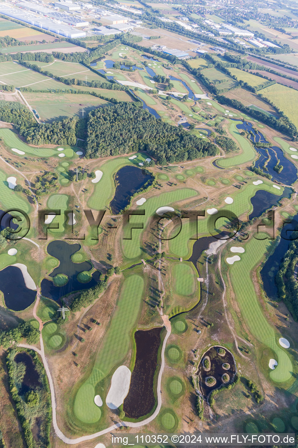 Grounds of the Golf course at Green Eagle Golf Courses in Winsen (Luhe) in the state Lower Saxony, Germany from the plane