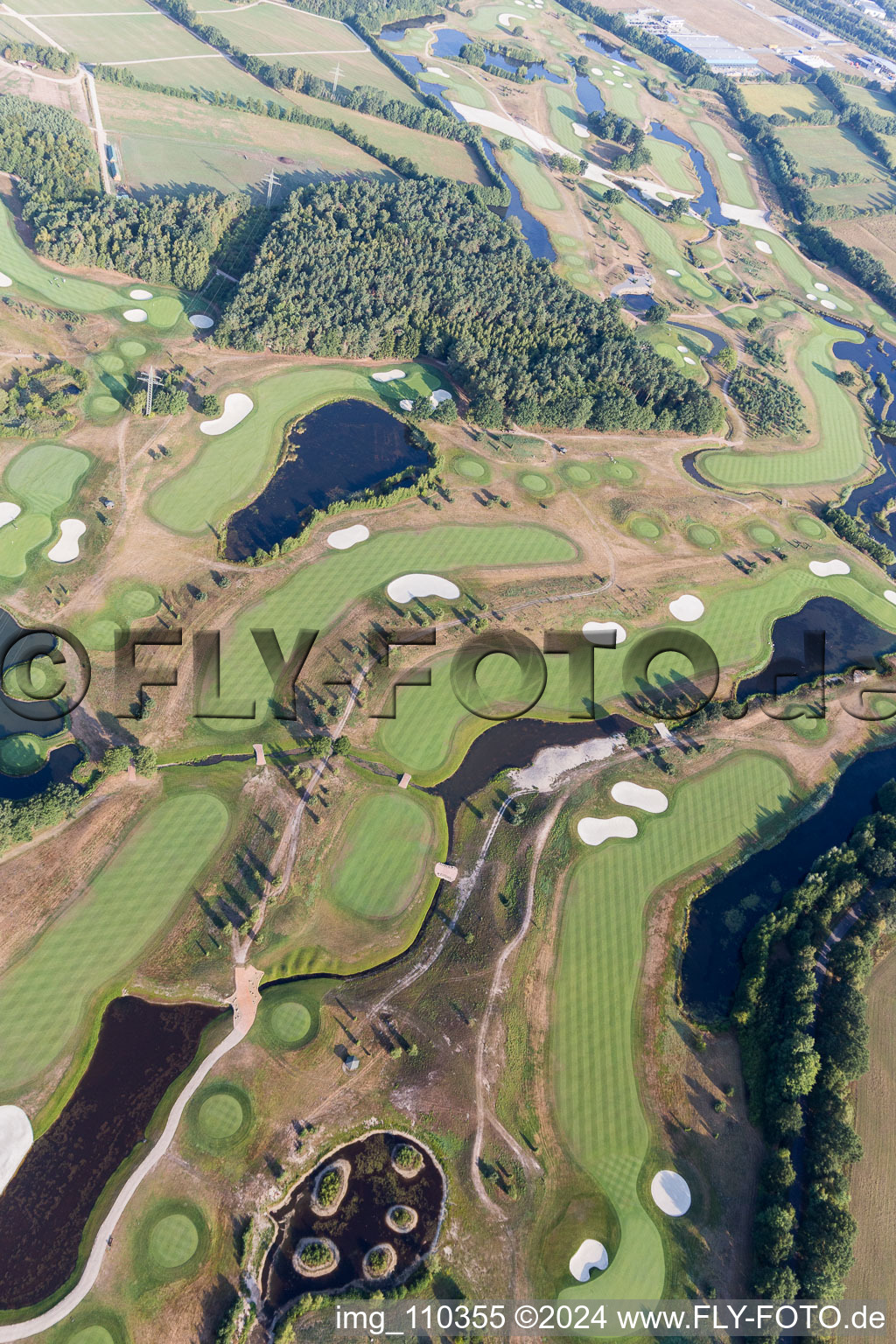 Grounds of the Golf course at Green Eagle Golf Courses in Winsen (Luhe) in the state Lower Saxony, Germany from the drone perspective