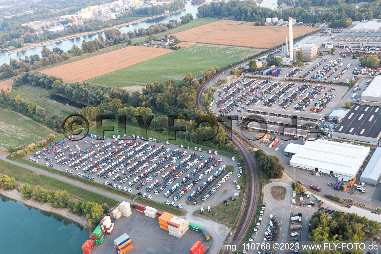 Aerial photograpy of Truck warehouse on the Rhine in the district Maximiliansau in Wörth am Rhein in the state Rhineland-Palatinate, Germany