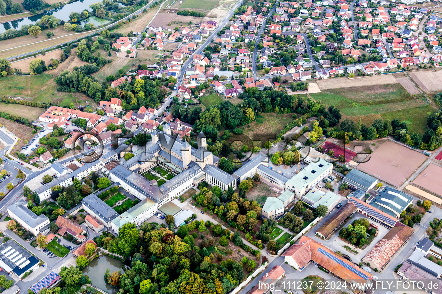 Aerial view of Complex of buildings of the monastery Abtei Muensterschwarzach in Muensterschwarzach in the state Bavaria, Germany