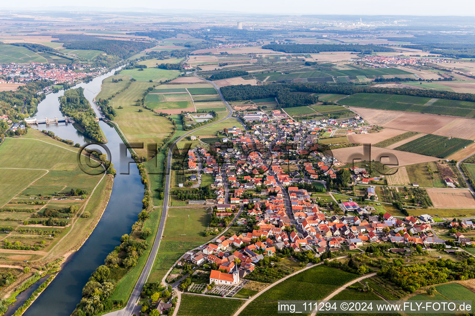 Aerial view of Village on the river bank areas of the Main river in Stammheim in the state Bavaria, Germany