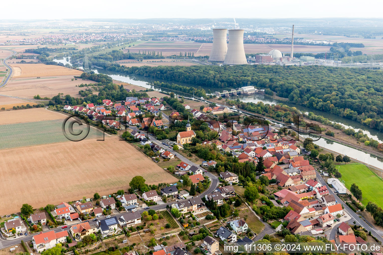 Village on the river bank areas of the Main opposite of Nucrlear power plant Schweinfurt in Garstadt in the state Bavaria, Germany