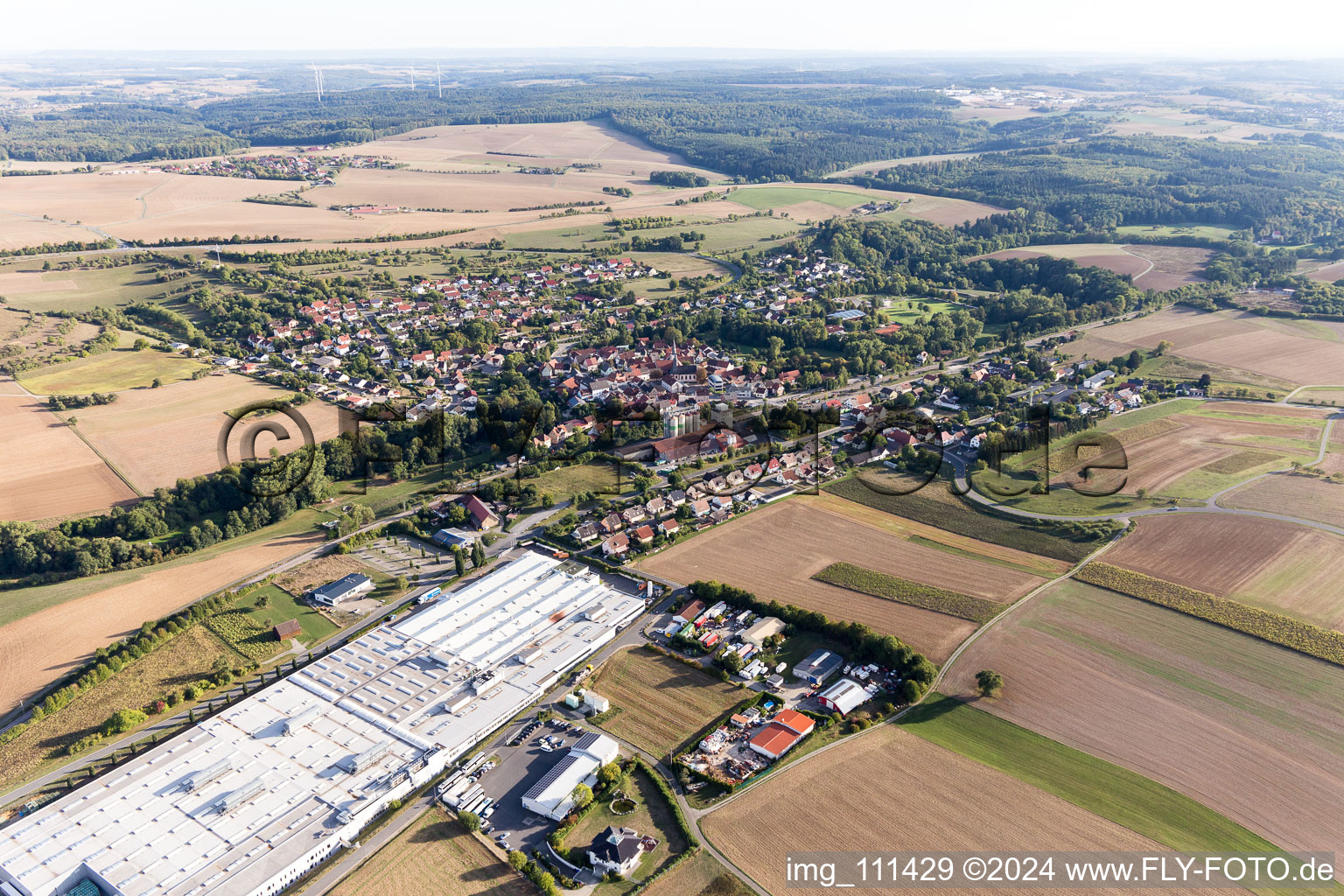 Aerial view of Building and production halls on the premises of Magna PT B.V. & Co. KG in Rosenberg in the state Baden-Wurttemberg, Germany