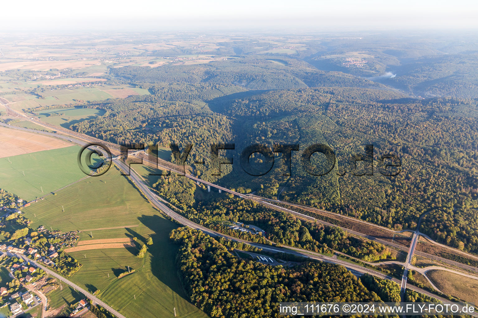 Motorway and Railway track crossing the vosges in the route network of the SNCFin Saverne in Grand Est, France