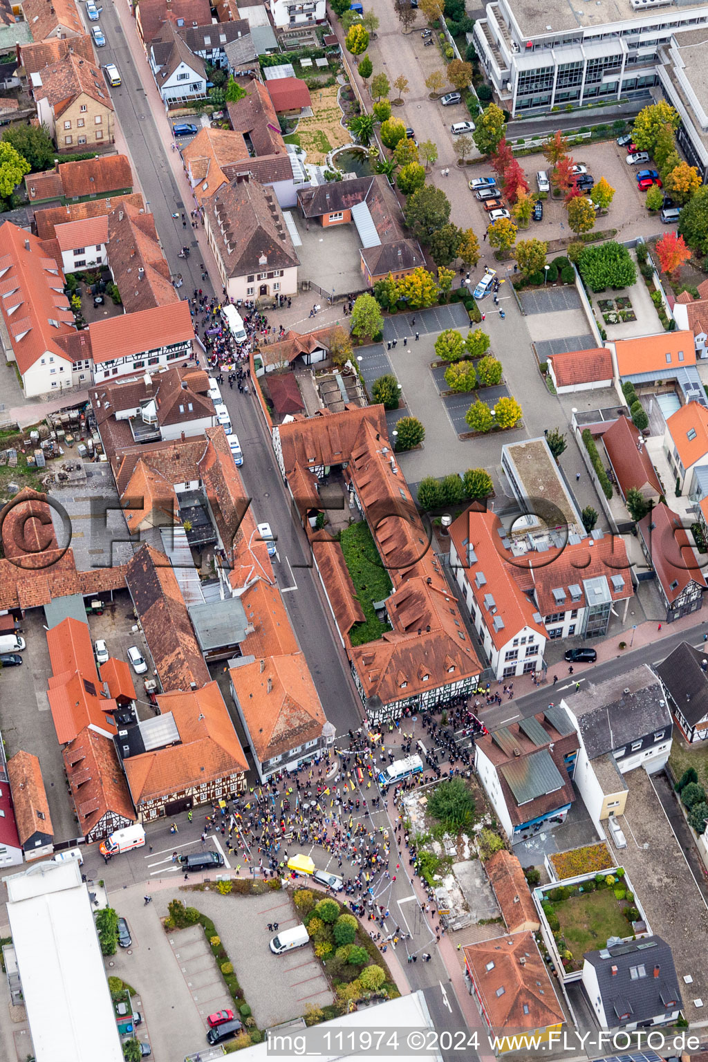 Aerial view of Participant of a political protest demonstration "Frauenbuendnis Kandel" vs. "AntiFa/Wir sind Kandel/Omas gegen rechts" in Kandel in the state Rhineland-Palatinate, Germany