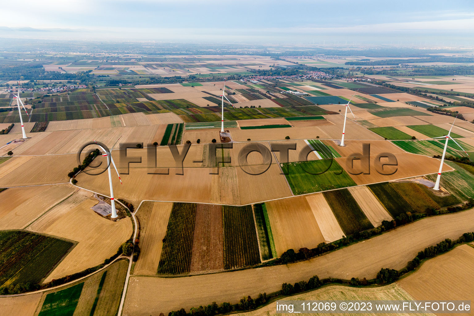 EnBW wind farm - wind turbine with 6 wind turbines in Freckenfeld in the state Rhineland-Palatinate, Germany from the plane