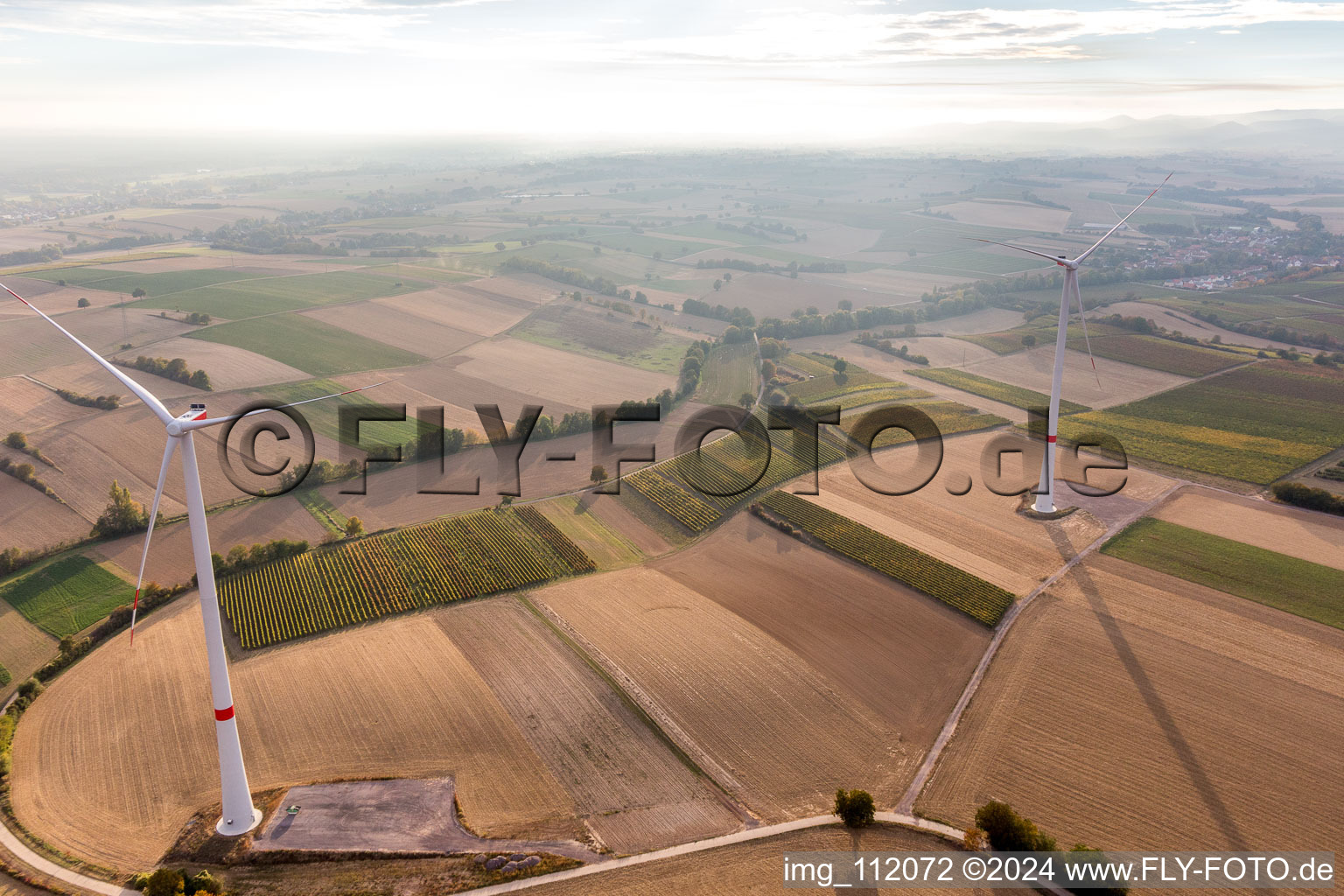 Bird's eye view of EnBW wind farm - wind energy plant with 6 wind turbines in Freckenfeld in the state Rhineland-Palatinate, Germany