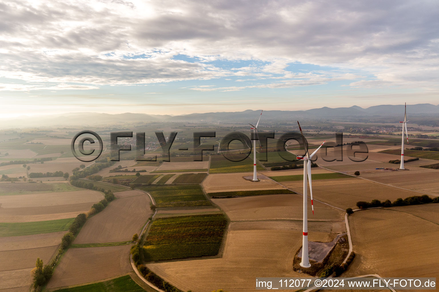 Drone image of EnBW wind farm - wind energy plant with 6 wind turbines in Freckenfeld in the state Rhineland-Palatinate, Germany