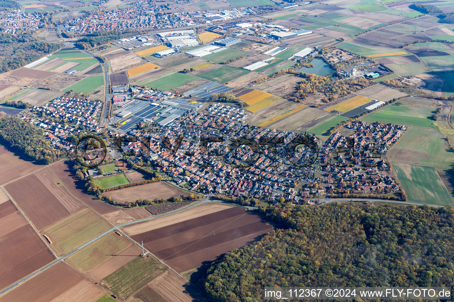 Village view on the edge of agricultural fields and land in Roethlein in the state Bavaria, Germany