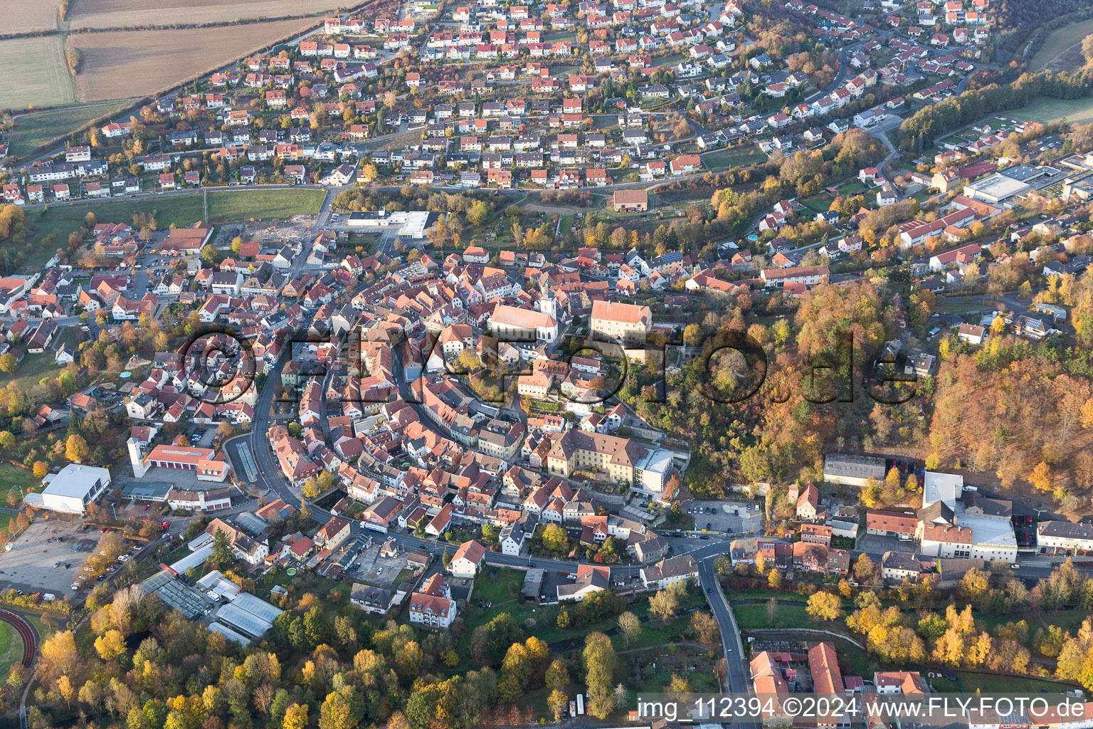 Aerial view of Town View of the streets and houses of the residential areas in Arnstein in the state Bavaria, Germany