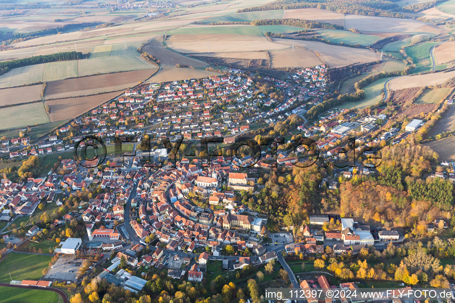 Aerial photograpy of Town View of the streets and houses of the residential areas in Arnstein in the state Bavaria, Germany