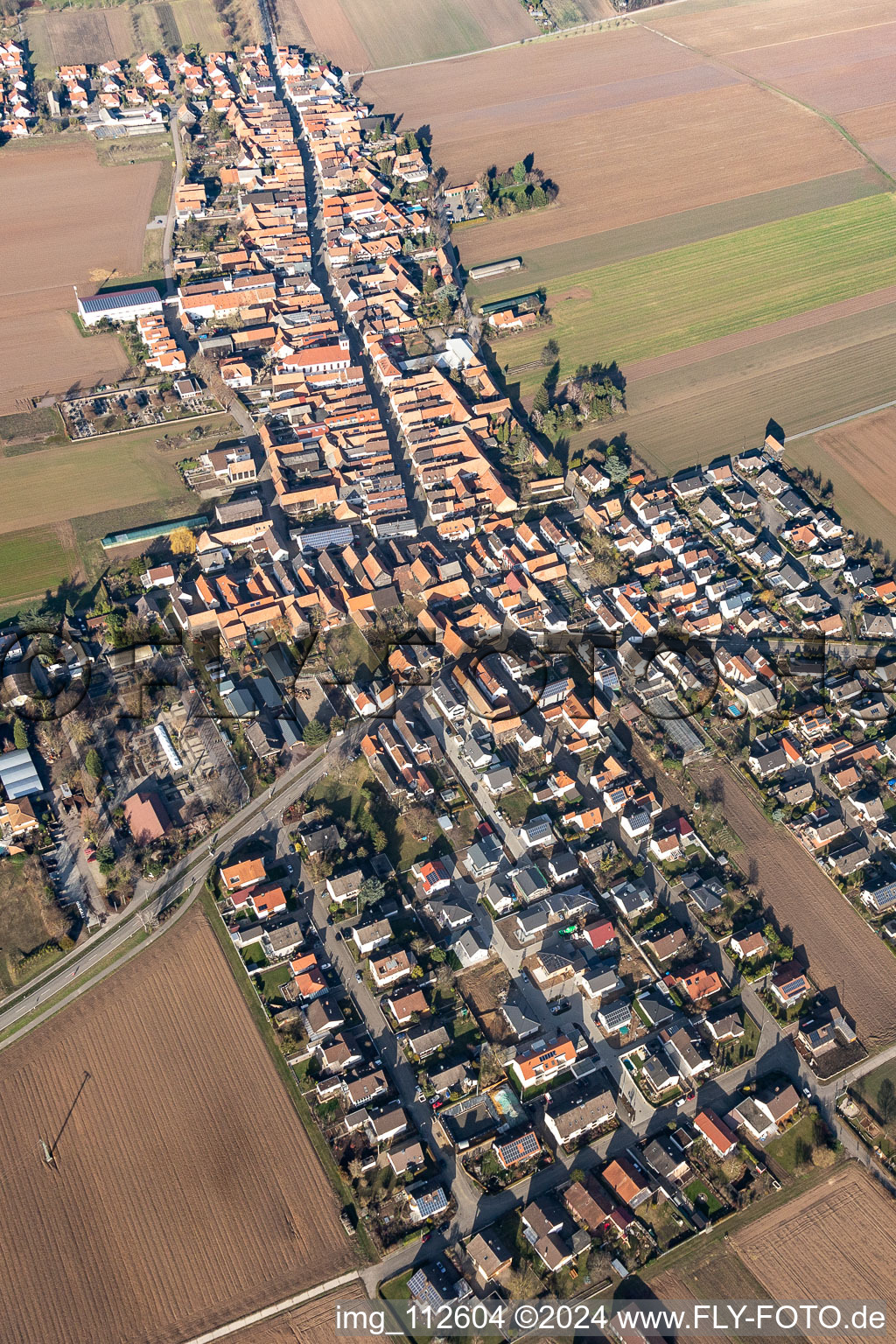 Aerial view of Village - view on the edge of agricultural fields and farmland in the district Hayna in Herxheim bei Landau (Pfalz) in the state Rhineland-Palatinate, Germany