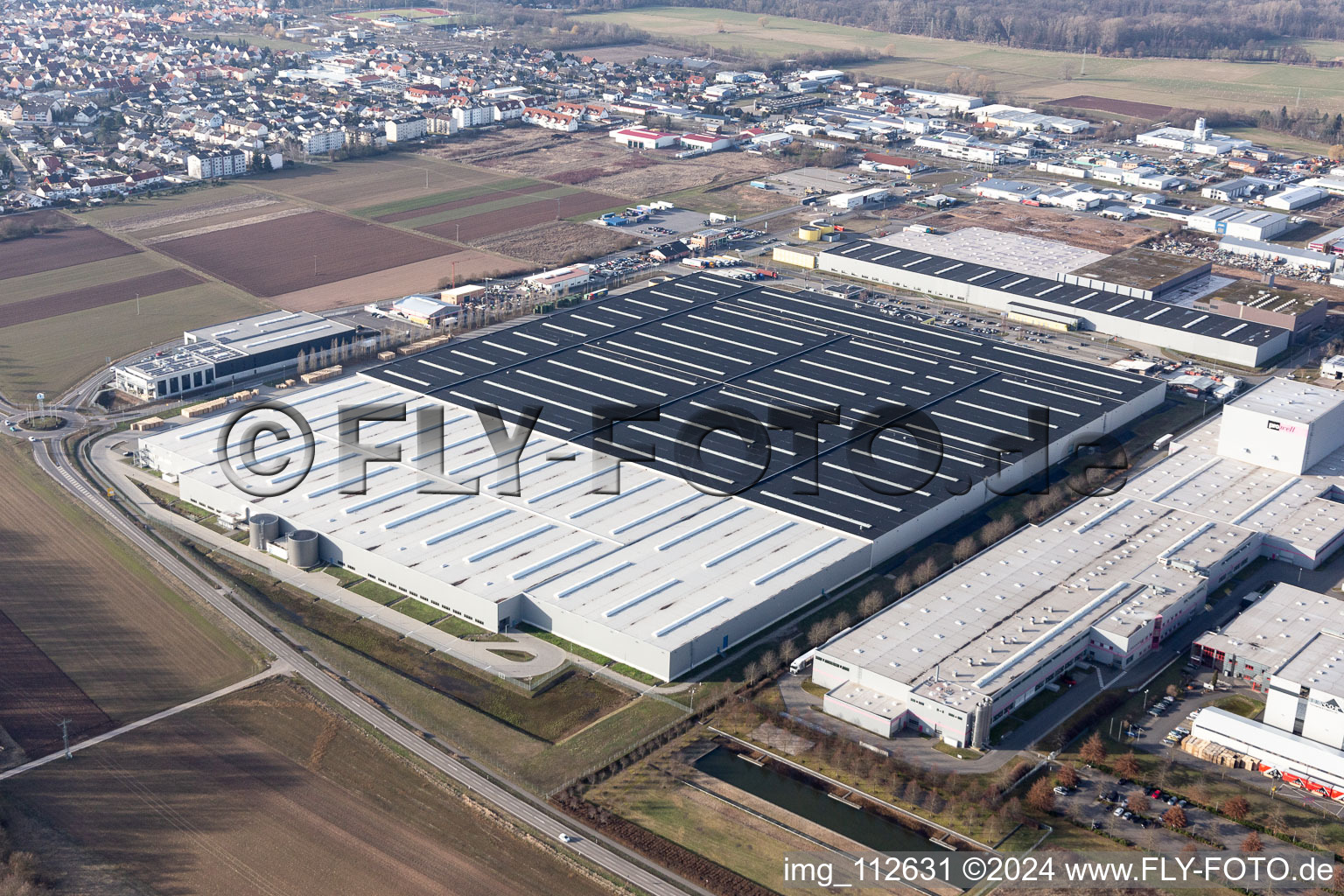 Aerial view of High-bay warehouse building complex and logistics center on the premises of Merceof Benz Spare Part storage in Offenbach an der Queich in the state Rhineland-Palatinate, Germany
