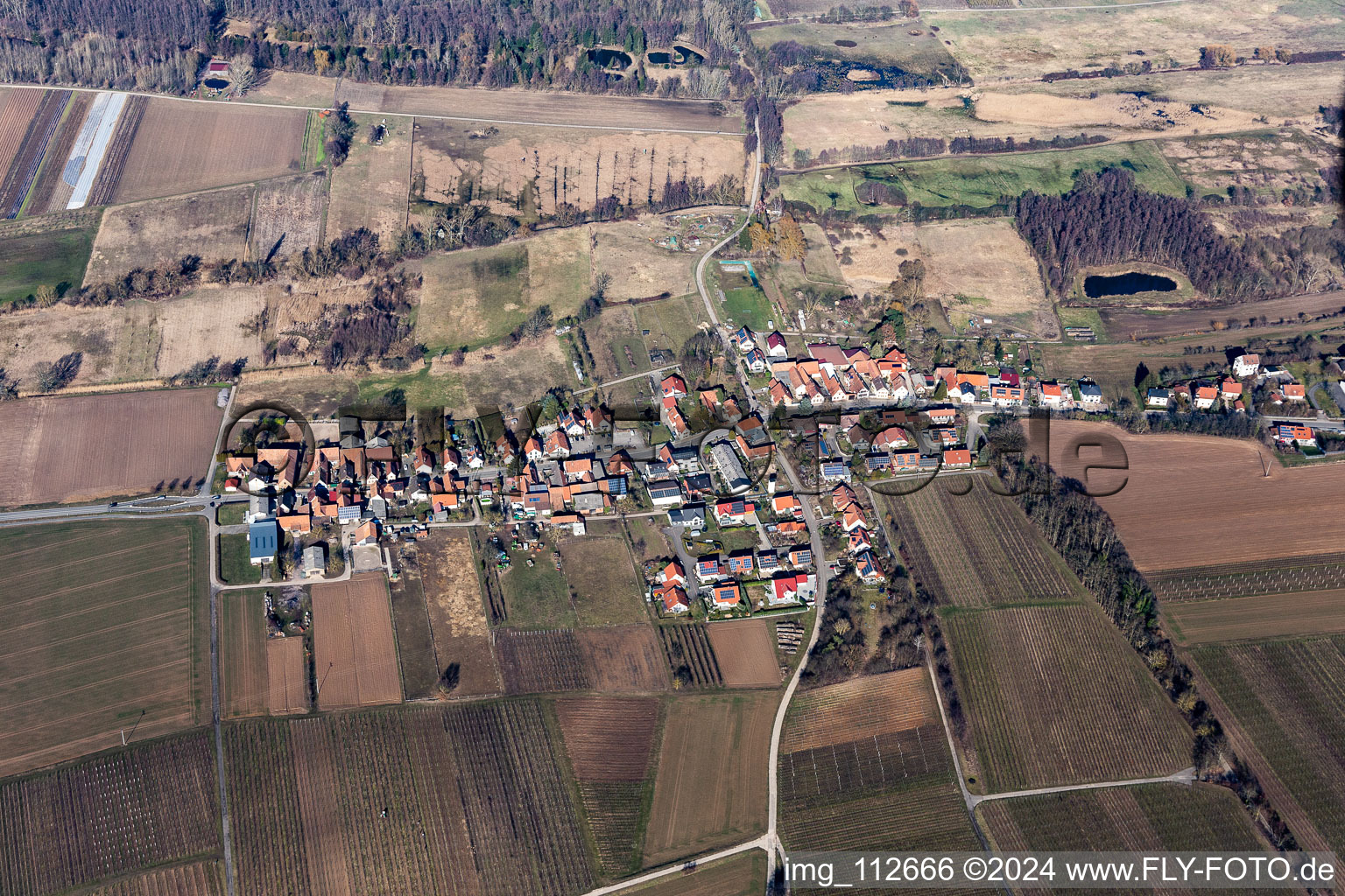 Village - view on the edge of agricultural fields and farmland in Hergersweiler in the state Rhineland-Palatinate