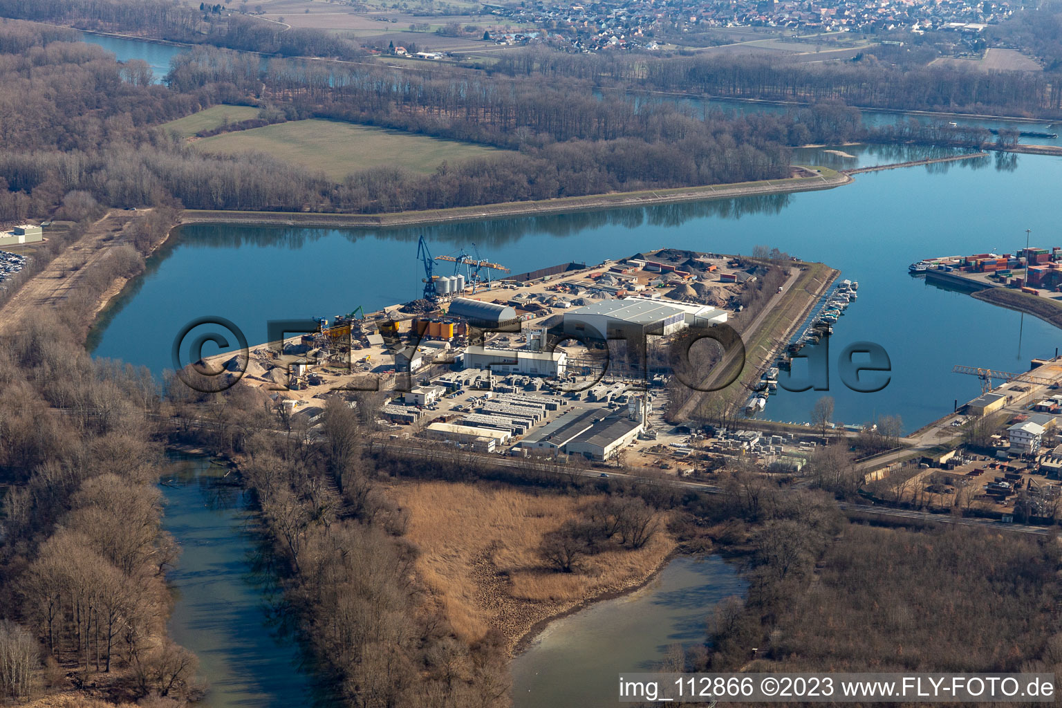 Quays and boat moorings at the port of the inland port of the Rhine river in Germersheim in the state Rhineland-Palatinate, Germany