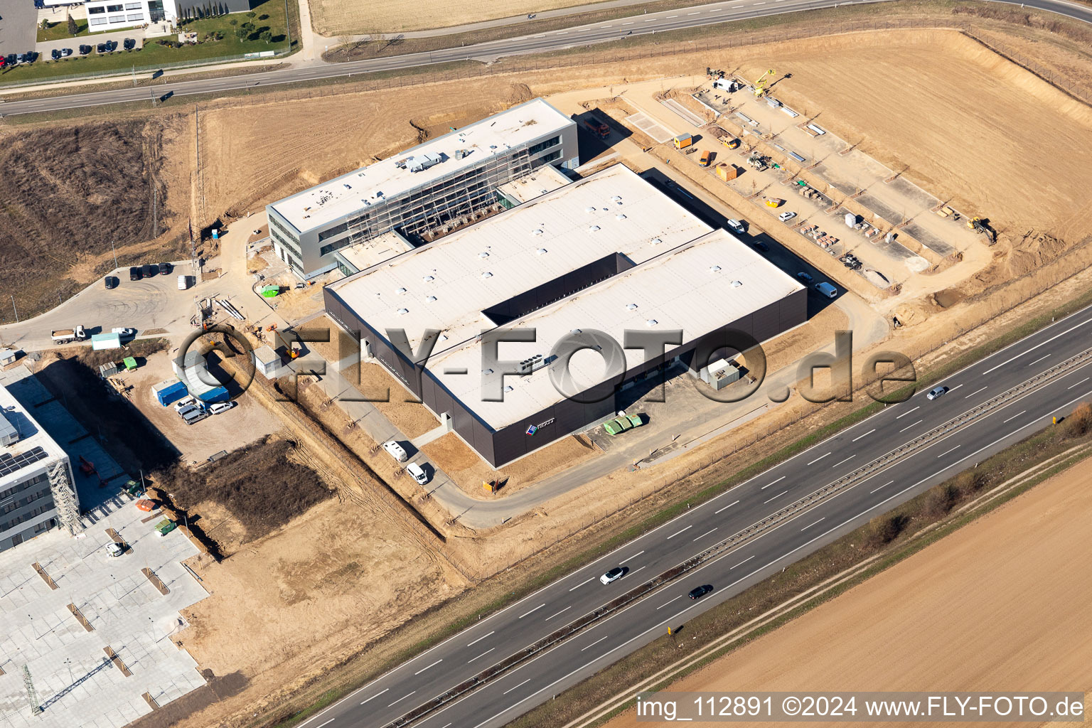 New building - construction site on the factory premises of Eizo GmbH on Gewerbegebiet Nord in Ruelzheim in the state Rhineland-Palatinate, Germany