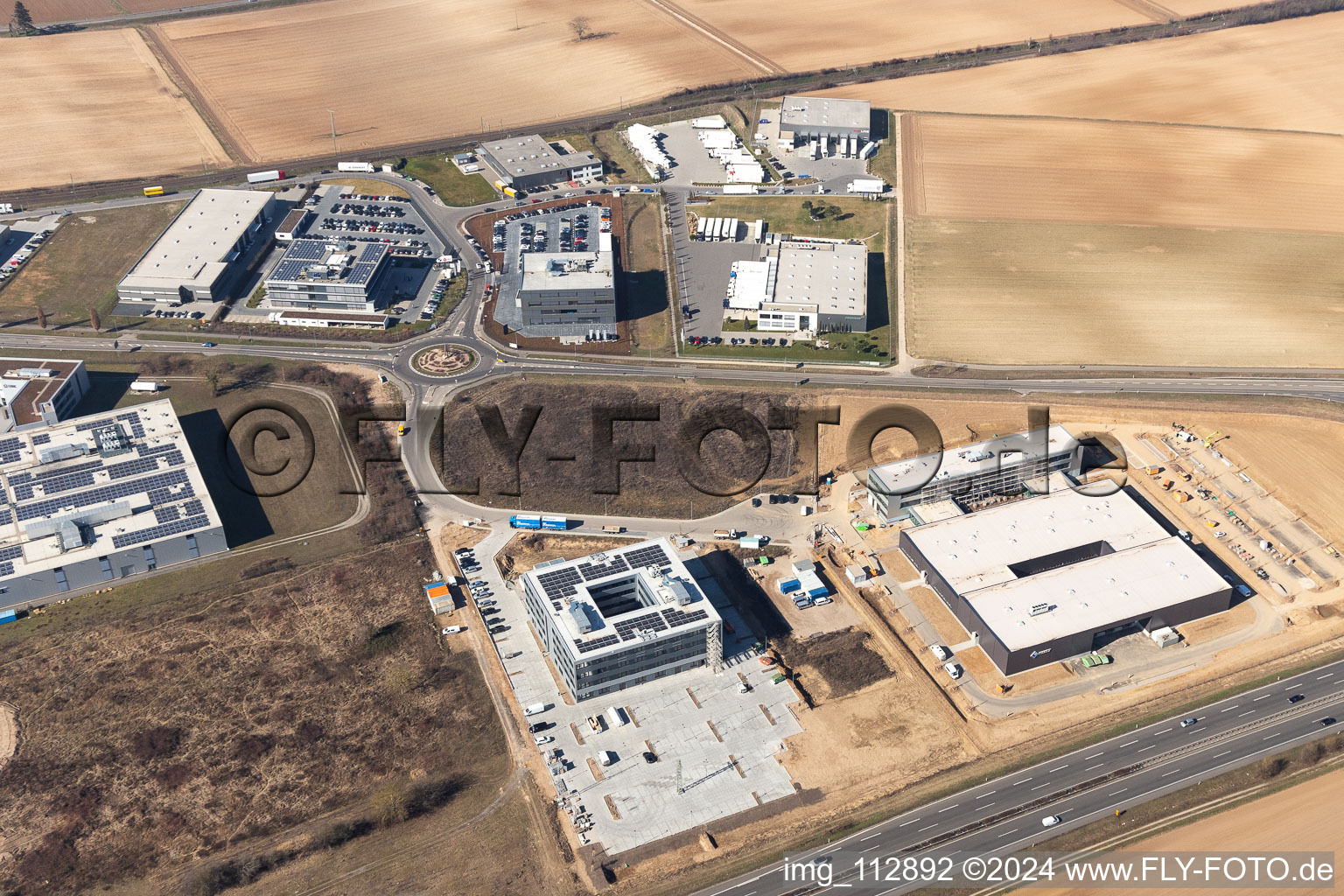 Aerial view of New building - construction site on the factory premises of Eizo GmbH on Gewerbegebiet Nord in Ruelzheim in the state Rhineland-Palatinate, Germany