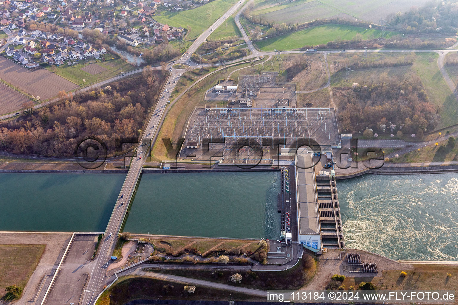 Site of the substation for voltage conversion and electrical power supply of Electricite De France E.D.F on Rhine-side-channel opposite of Breisach in Vogelgrun in Grand Est, France