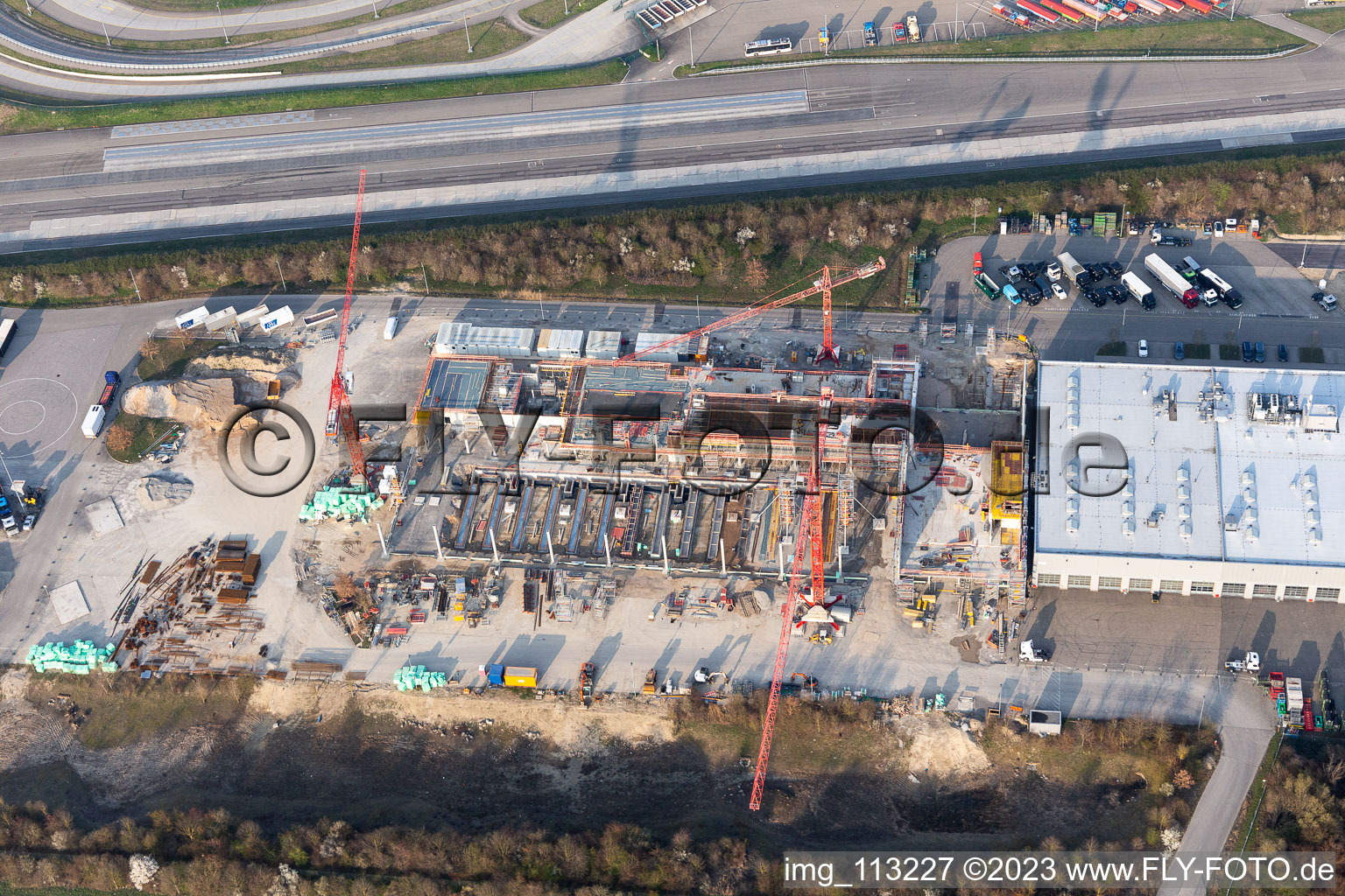 Aerial view of Construction site for the new building and Erweiterung of and expansion of the truck development and testing center in the district Industriegebiet Woerth-Oberwald in Woerth am Rhein in the state Rhineland-Palatinate, Germany