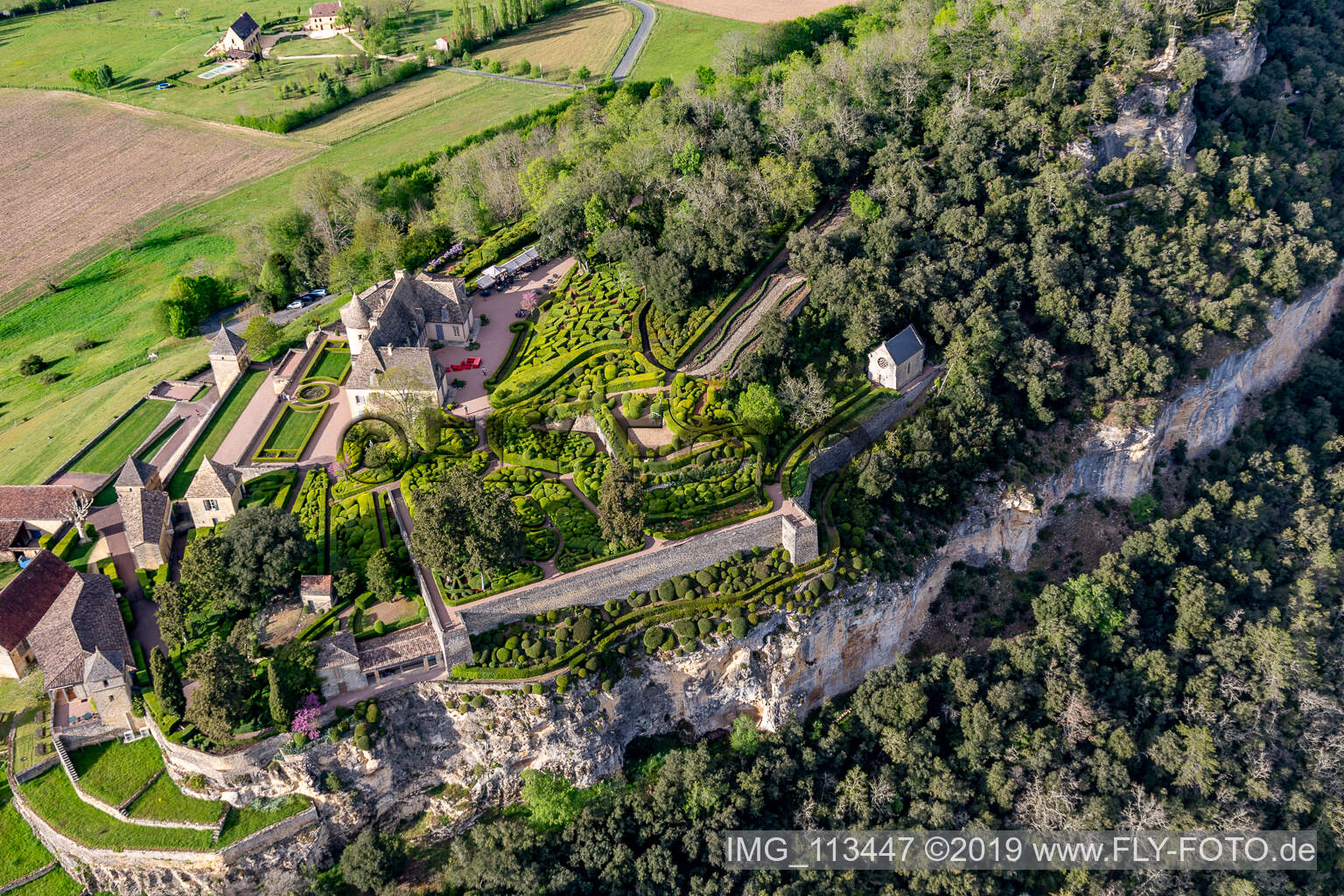 Aerial view of Park and gardenss of the castle Marqueyssac above the Dordogne in Vezac in Nouvelle-Aquitaine, France