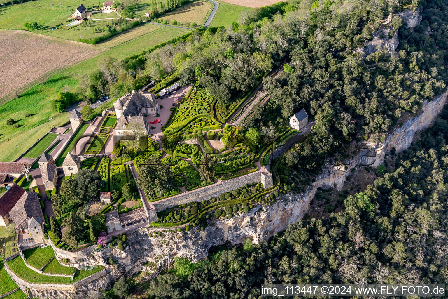 Aerial view of Park and gardenss of the castle Marqueyssac above the Dordogne in Vezac in Nouvelle-Aquitaine, France