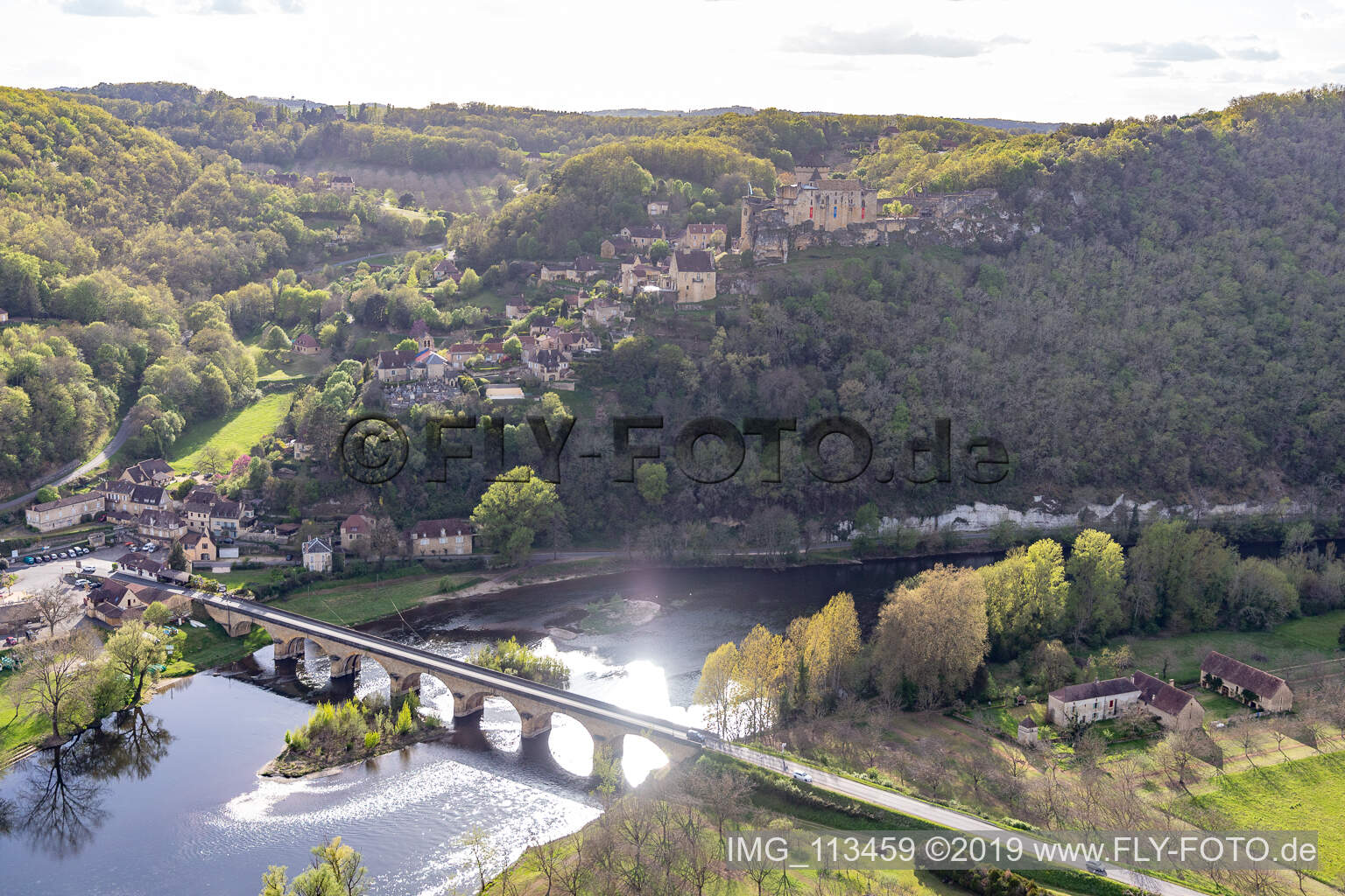 Aerial view of Dordogne bridge under Chateau de Castelnaud-la Chapelle in Castelnaud-la-Chapelle in the state Dordogne, France